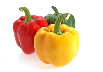Sweet Red, Green and Yellow Pepper, capsicum annuum against White Background