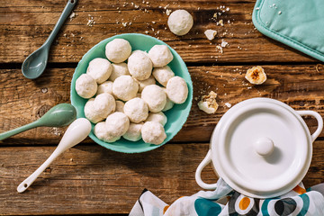 Traditional Christmas snowballs cookies, biscuits covered sugar powder . Top view