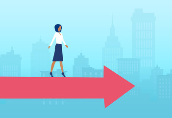 Fototapeta premium Vector of a business woman walking on a red arrow on a city scape background