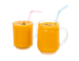 Fresh mango fruit juice on white background