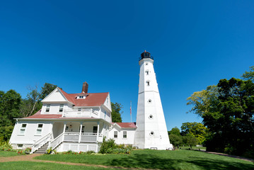 Fototapeta na wymiar Lake Michigan lighthouse in summer 