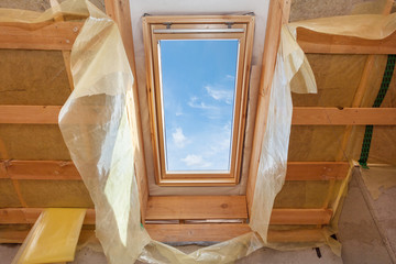 Mansard with environmentally friendly and energy efficient skylight window