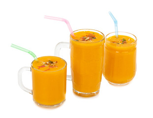 Fresh mango fruit juice on white background