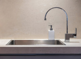 Lab or kitchen sink and water tap closeup view.