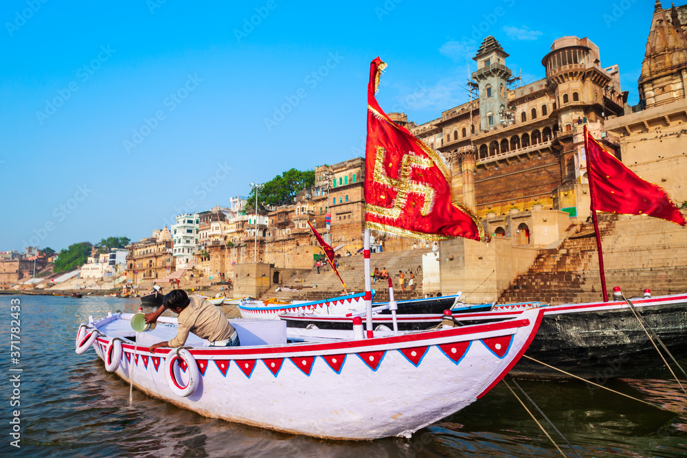 Wall mural colorful boats and ganges river