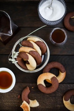 Chocolate chip cookies on the table. Table setting for breakfast. Tea party with sweets. Abbracci. Italian bisquits.