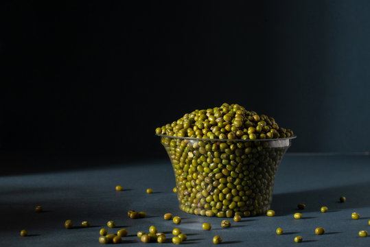 Mung bean in glass pot with  black background