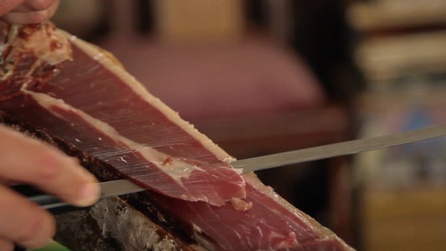 Cutting jabugo ham.