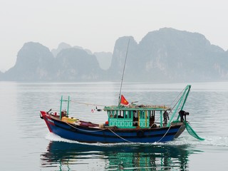 Vietnam, Quang Ninh Area, Halong Bay or Ha Long Bay Unesco World Heritage Site, Fishing Boa