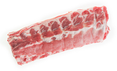 Raw pork ribs on a white background, isolate. View from above.
