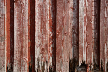 Fragment of an old painted wooden wall. Background, texture, boards. Aged wood texture. 