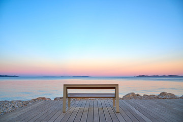 Fototapeta na wymiar empty bench in hyeres at sunset france provence
