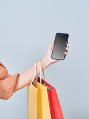 Women using smartphones to pay