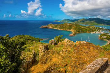 A view from the cliffs on Shirley Heights lookout towards English Harbour in Antigua