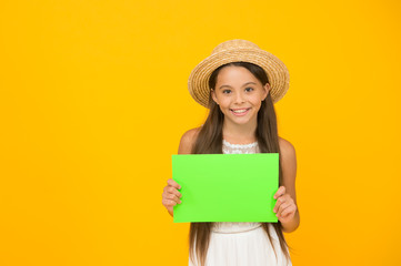 best travel agency. summer camp activity. copy space. summer vacation and holiday. happy childhood. cheerful little girl hold paper sheet. beach fashion for kids. small child on yellow background