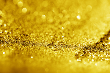 glitter light sparkle yellow golden gorgeous bokeh defocused abstract background shiny.