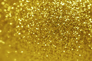 Bright defocused round pieces golden color pattern