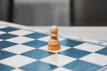 chessman pawn on a chessboard
