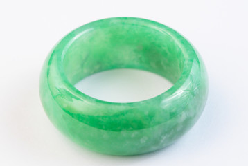 Green jade ring on white background © brostock