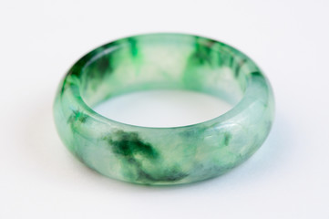 Texture of jadeite ring on white background