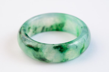 Moss in snow jadeite ring on white background