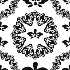 seamless pattern, abstraction in monochrome colors, mandala, ornament for wallpaper and fabric, wrapping paper, background for different designs