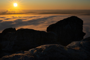 Sunrise Above the Clouds