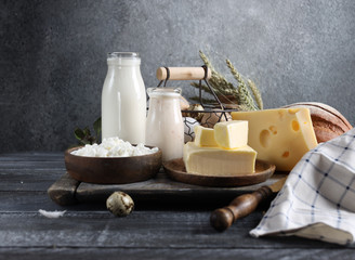 dairy products assortment on wooden board