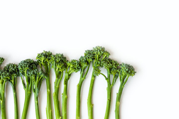 Fresh broccolini isolated on white background with copy space.