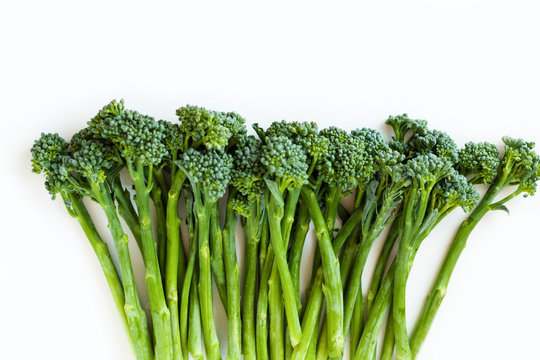 Fresh broccolini isolated on white background with copy space.
