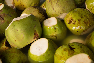 green coconuts, unripe nuts collected in Thailand