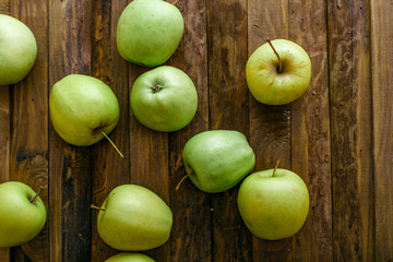 apples on a wooden table