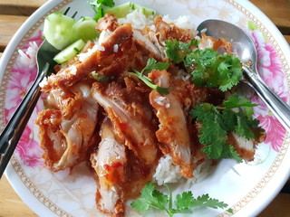 sliced Hainan-style chicken with marinated rice,Hainanese chicken rice,Steamed capon in flavored rice