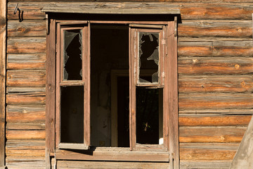 window of an old wooden house dust on the glass