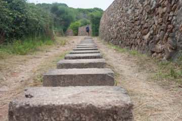 The stone wall is made without cement. Menorca
