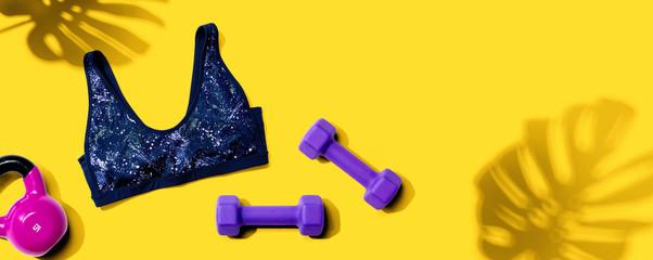 Fitness theme with equipments and a sportswear