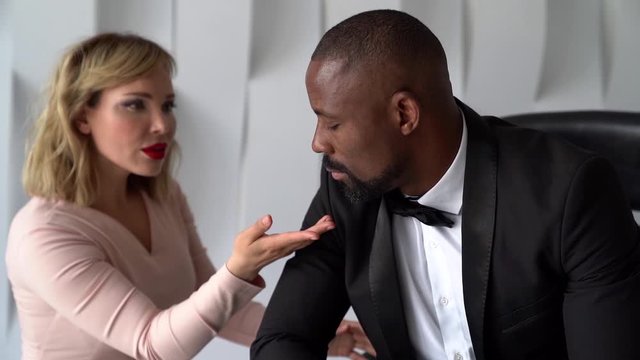Reusable couple in a grudge during a business meeting, family relations, conflict