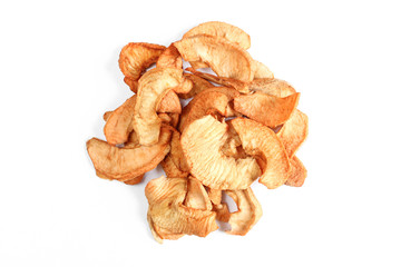 Dried slices of apple isolated on white background. Pile of meal ingredients