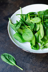 spinach green juicy leaves organic salad serving portion size natural product top view place for text copy space keto or paleo diet raw