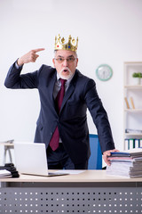 Old king businessman employee at workplace