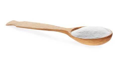 Wooden spoon of baking soda isolated on white