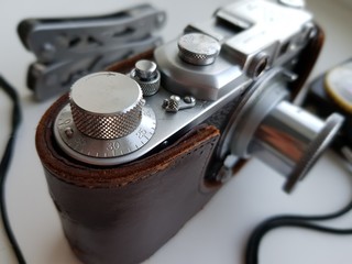 Vintage film camera in a leather case