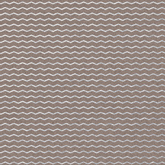 Metallic Silver Pattern on Cork Background