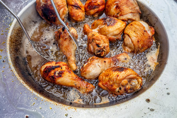 Roasted chicken legs with crispy golden brown skin