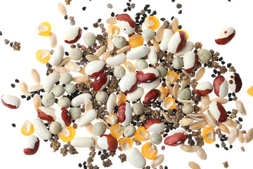 Fototapeta premium Mix of vegetable seeds on white background, top view
