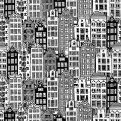 Seamless pattern. Black and white old houses of Amsterdam, Netherlands. Vector illustration on a white background.