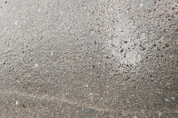Wet dark asphalt after rain.