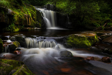 Fototapeta na wymiar Waterfalls of Blaen y Glyn One of the many closely connected waterfalls at Blaen y Glyn, near Merthyr Tydfil in the South Wales valleys, UK
