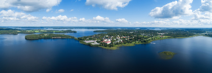 Beautiful summer panorama of Ikaalinen city at sunny day. Blue sky and clouds. Finland.