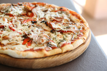 Delicious fresh pizza on table outdoors, closeup